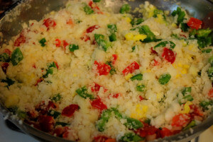 riced cauliflower, onions and peppers for stuffed cabbage cake