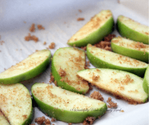 Air Fryer Apple Slices sprinkled with low carb brown sugar and spices