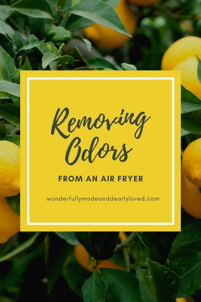 Removing odors from an air fryer using lemon juice 